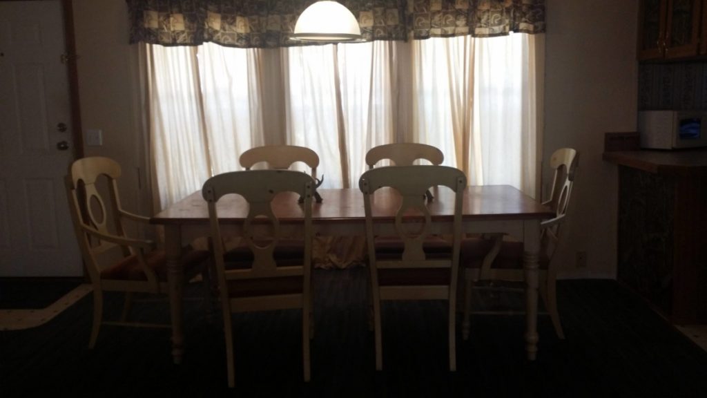 A Table With Four Chairs-Deer Hunting Alabama-Rock Bottom Ranch 1831 Rocky Hill Rd Uriah Al 36480 251-233-9720